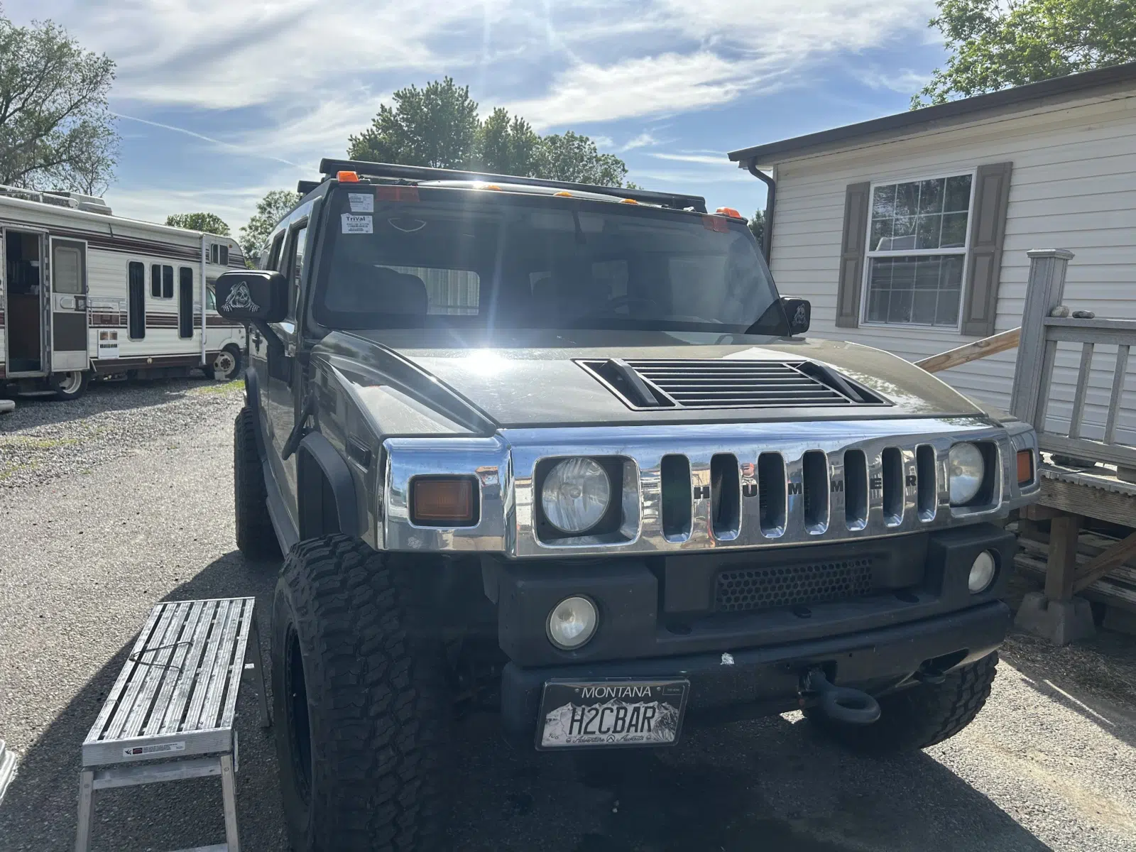 Hummer H2 parked outside with fresh windshield installed — A+ Glass LLC in Billings